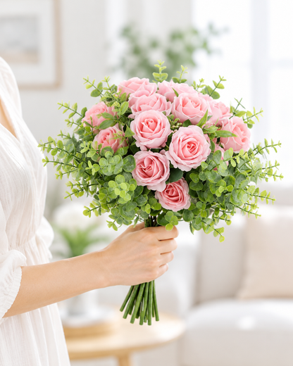Pink Artificial Rose Bouquet with Greenery held in a hand