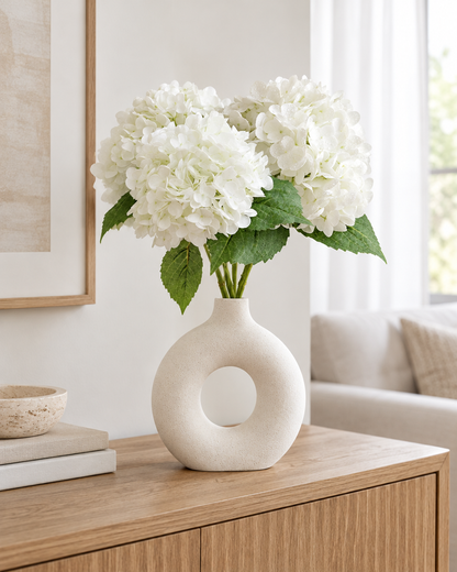 White Artificial Hydrangea Stems styled in a ceramic vase on a console table (vase sold separately)