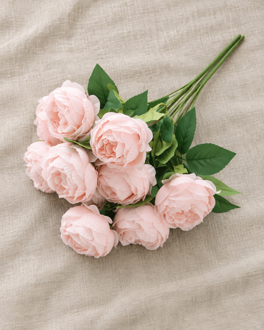 Soft Pink Artificial Rose Bunch, shown alone on a linen background