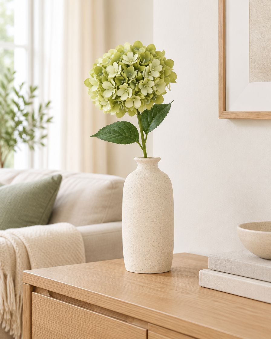Sage Green Artificial Hydrangea Stem styled in a ceramic vase on a console table (vase sold separately)