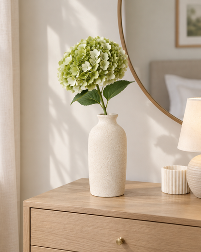 Sage Green Artificial Hydrangea Stem styled in a ceramic vase on a dresser (vase sold separately)
