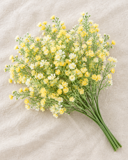 Yellow Artificial Baby's Breath Bunch, shown alone on a linen background