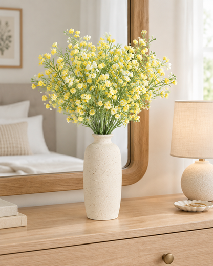Yellow Artificial Baby's Breath Bunch styled in a ceramic vase on a dresser (vase sold separately)
