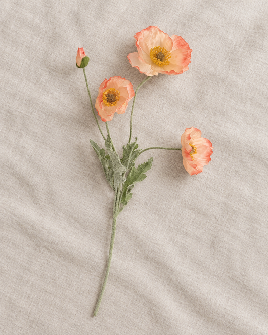 Peach Artificial Poppy Stem, shown alone on a linen background