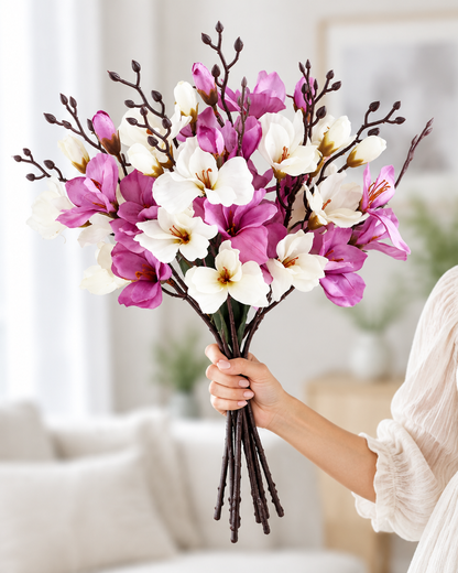 White and Purple Artificial Magnolia Branches held in a hand