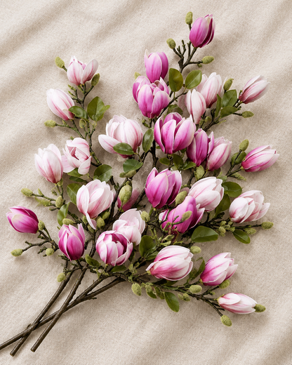Purple & Pink Artificial Magnolia Branches, shown alone on a linen background