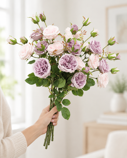 Lilac & Blush Artificial Rose Spray held in a hand