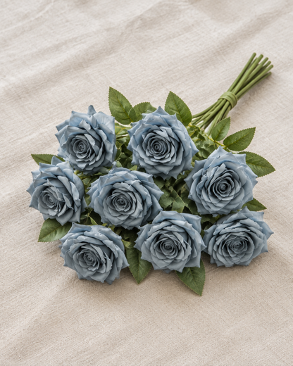 Dusty Blue Artificial Rose Bouquet, shown alone on a linen background