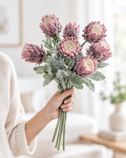 Dusty Pink Artificial Protea Stems held in a hand