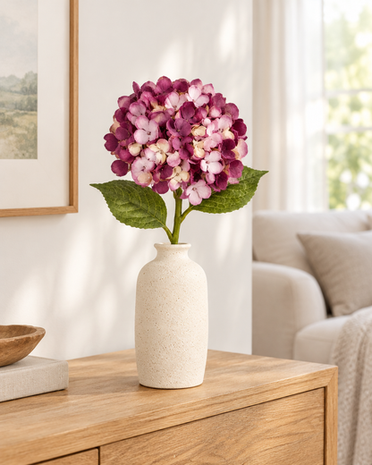 Plum Purple Artificial Hydrangea Stem styled in a ceramic vase on a console table (vase sold separately)