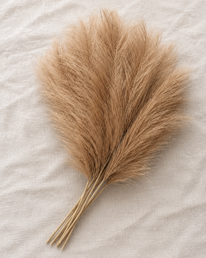 Light Brown Artificial Pampas Grass Stems, shown alone on a linen background