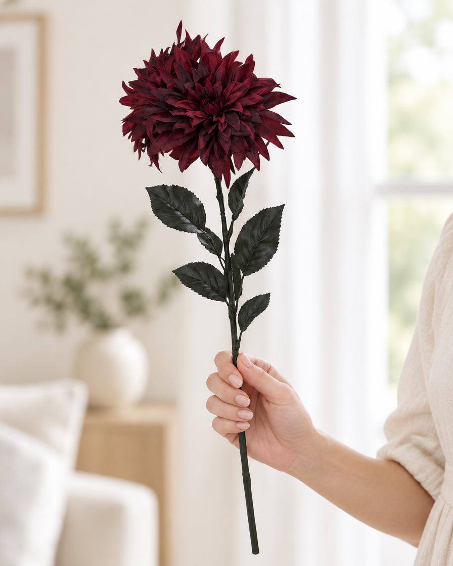 Burgundy Artificial Dahlia Stems held in a hand