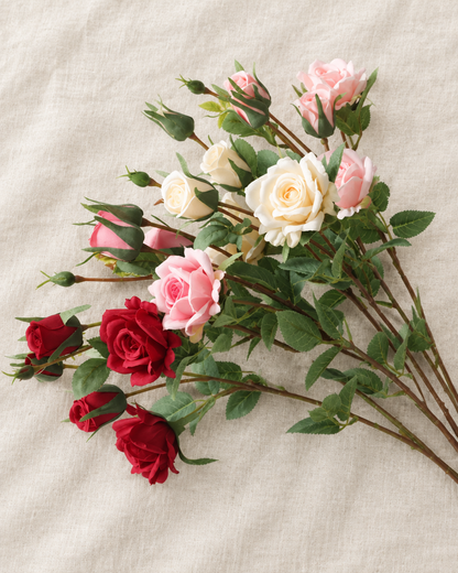 Red Pink and Cream Artificial Rose Branches, shown alone on a linen background