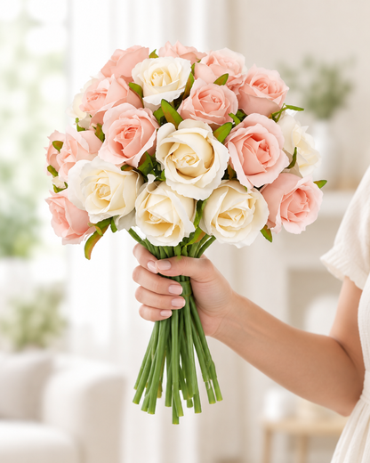 Peach Pink and Cream Artificial Rose Bouquet held in a hand