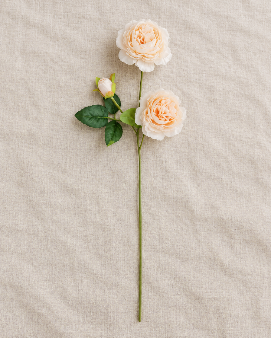 Peach Artificial Peony Stem, shown alone on a linen background