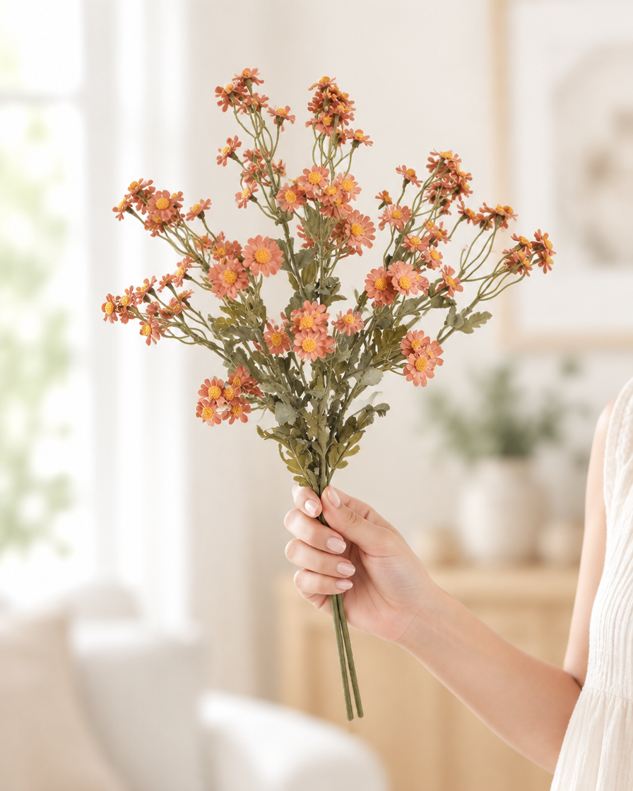 Terracotta Artificial Chamomile Daisy Stems held in a hand