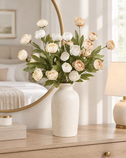 Cream and Apricot Artificial Ranunculus Stems styled in a ceramic vase on a dresser (vase sold separately)
