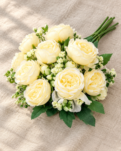 Cream Yellow Artificial Peony Bouquet, shown alone on a linen background