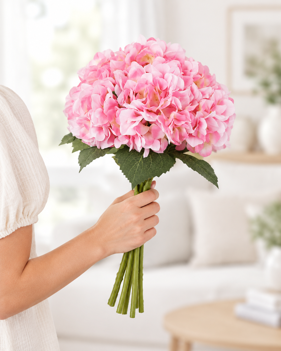 Pink Artificial Hydrangea Bouquet held in a hand