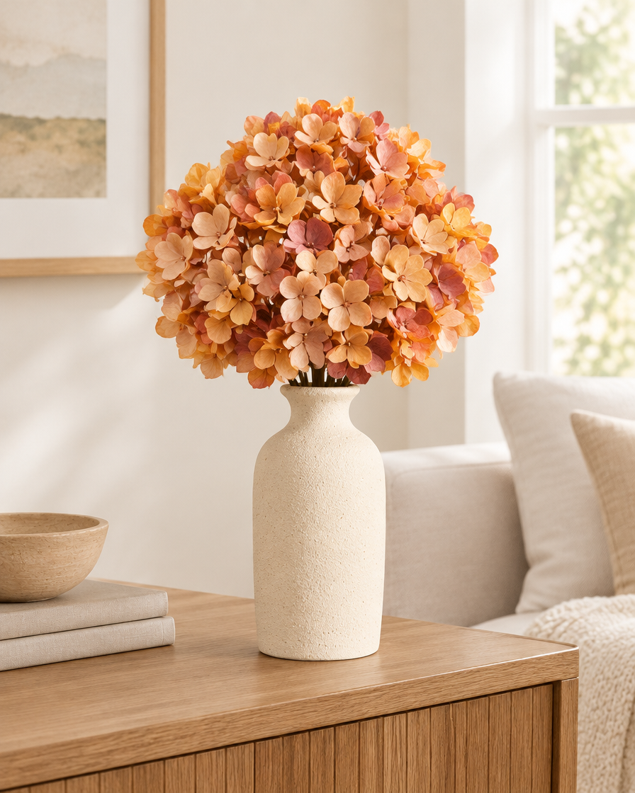 Amber Orange Artificial Hydrangea Bouquet styled in a ceramic vase on a console table (vase sold separately)