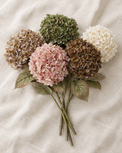 Vintage Multicolour Artificial Hydrangea Bouquet, shown alone on a linen background
