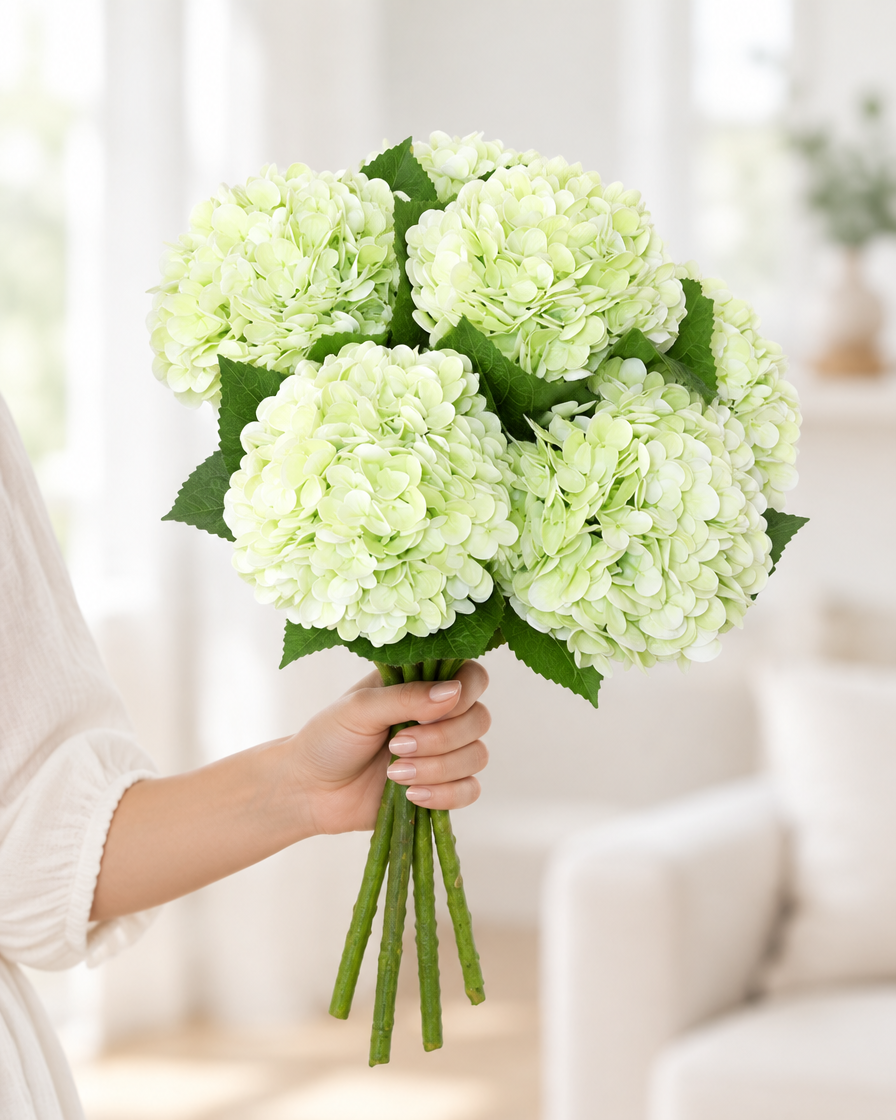 Pale Green Artificial Hydrangea Bouquet held in a hand