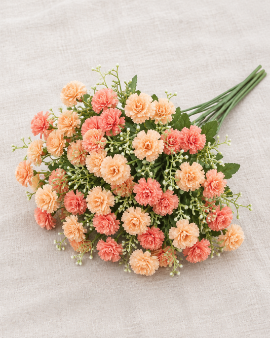 Peach and Coral Artificial Carnation Bouquet, shown alone on a linen background