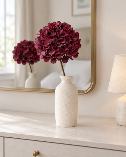 Burgundy Artificial Hydrangea Stem styled in a ceramic vase on a dresser (vase sold separately)
