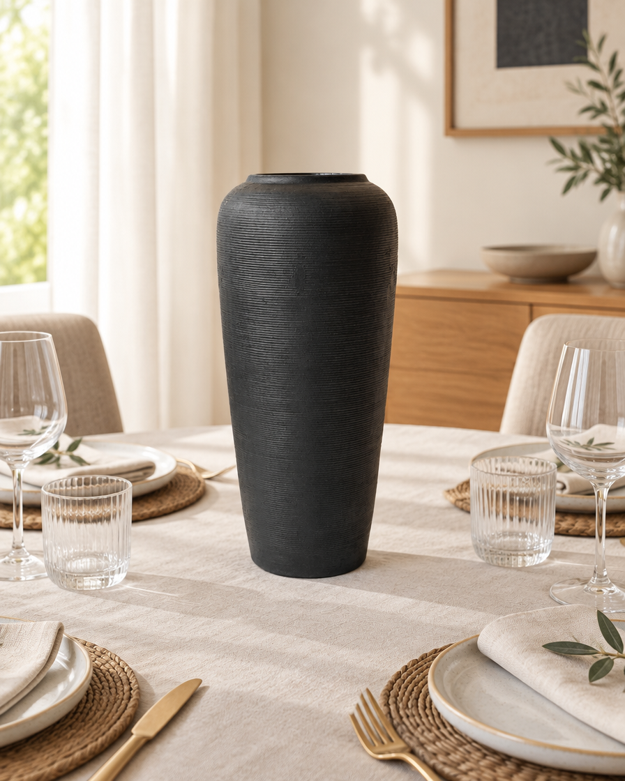 Matte Black Fine-Ridged Ceramic Vase on a dining table
