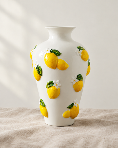 White Porcelain Vase with 3D Lemon Relief, shown alone on a linen background