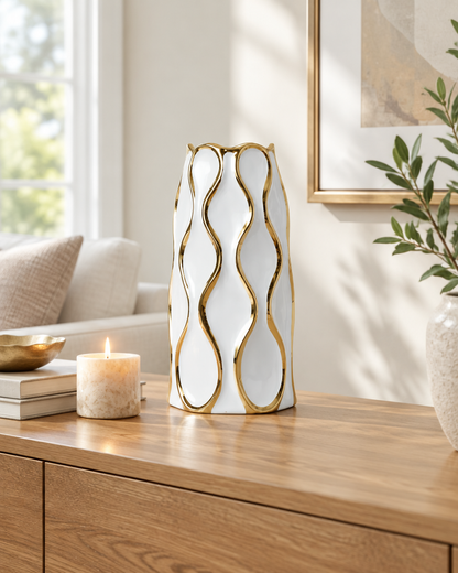 White Ceramic Vase with Gold Wavy Lines on a console table