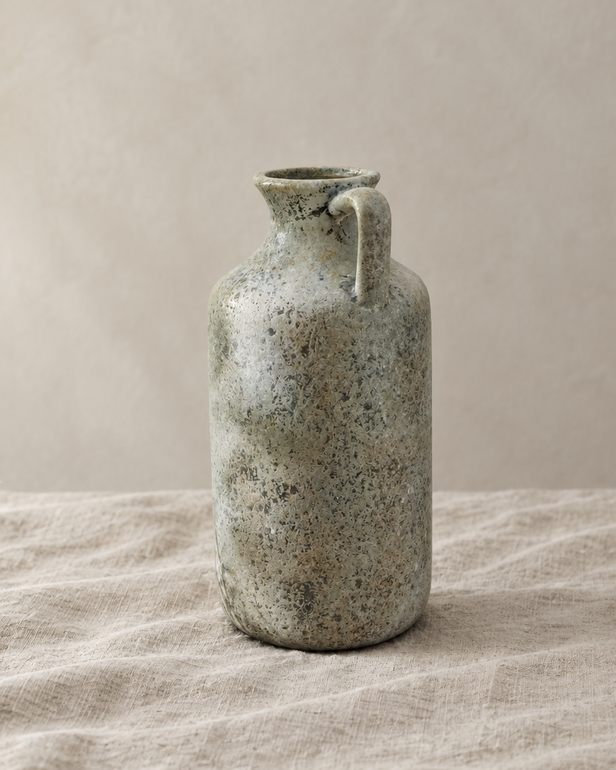 Rustic Speckled Grey Ceramic Jug Vase, shown alone on a linen background