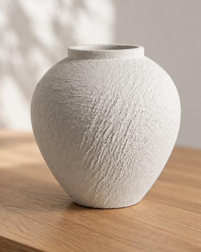 Close-up of the finish of the white bark-textured ceramic vase