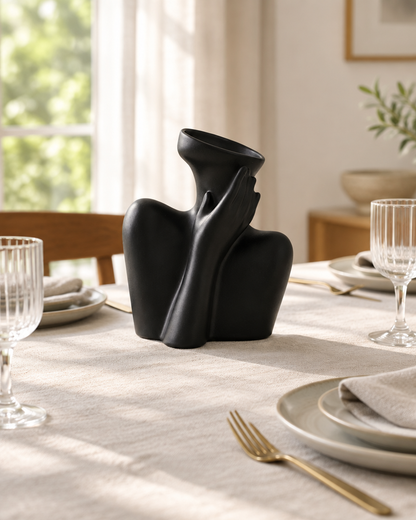 Matte Black Abstract Body Sculpture Ceramic Vase on a dining table