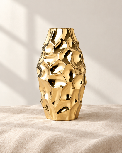 Gold Hammered-Finish Ceramic Vase, shown alone on a linen background