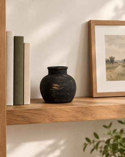 Rustic Black Distressed Ceramic Vase on a wooden shelf