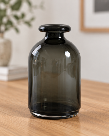 Close-up of the finish of the smoked dark grey bottle vase