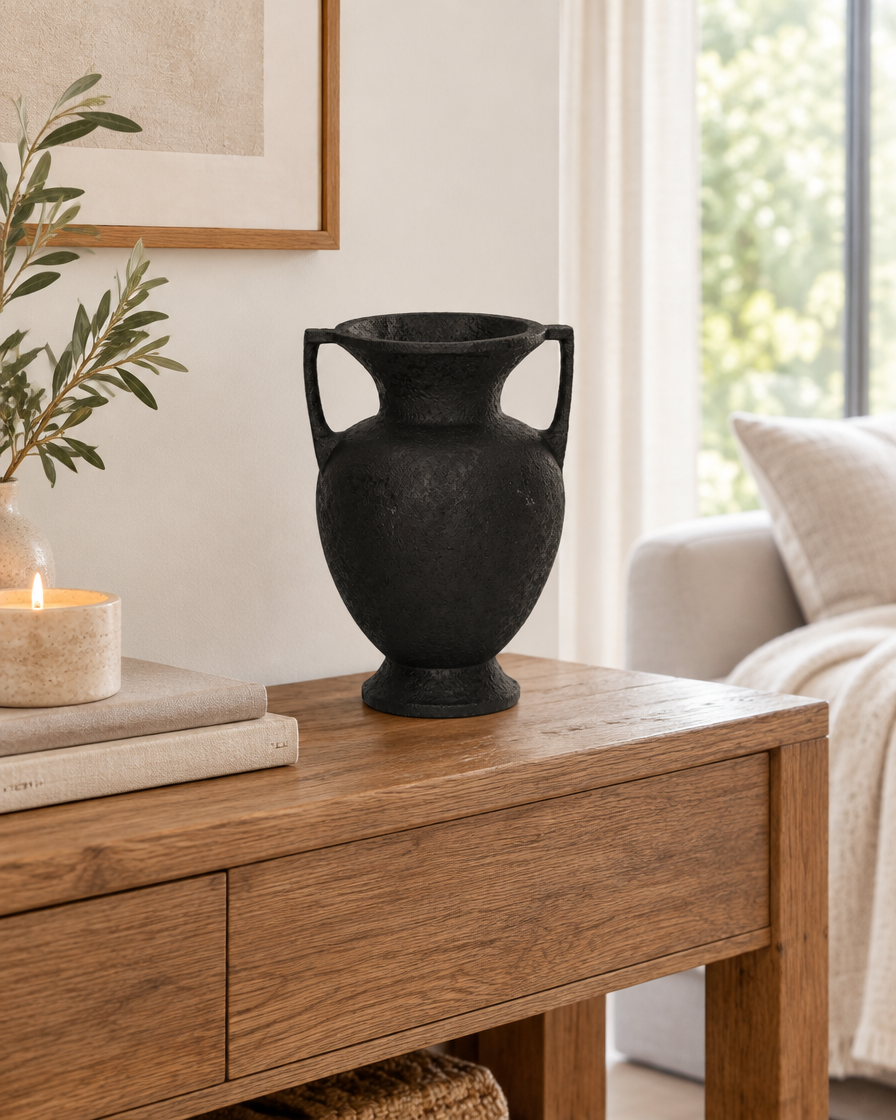 Matte Black Resin Amphora Vase with Two Handles on a console table
