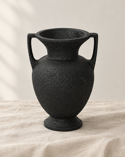Matte Black Resin Amphora Vase with Two Handles, shown alone on a linen background
