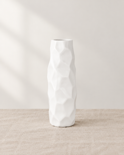 Tall White Faceted Geometric Resin Vase, shown alone on a linen background