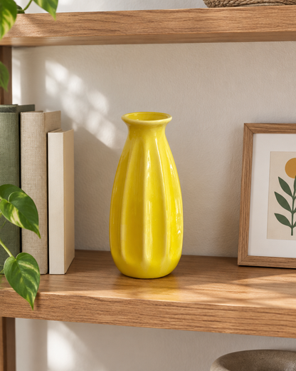 Yellow Ribbed Ceramic Bud Vase on a wooden shelf