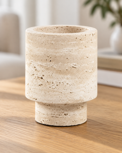 Close-up of the finish of the cream banded stone-look footed vase
