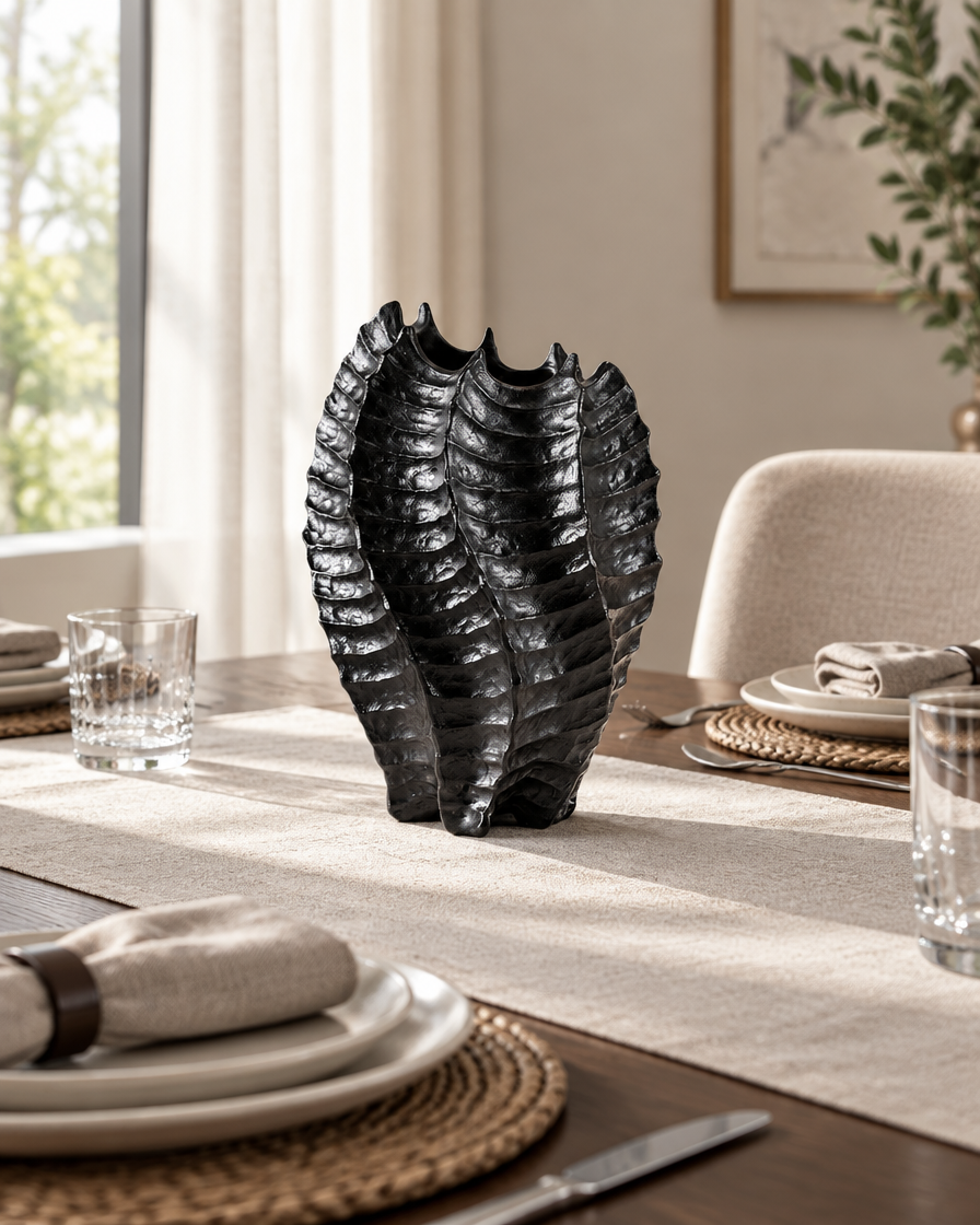 Black Glossy Ribbed Coral-Shaped Vase on a dining table