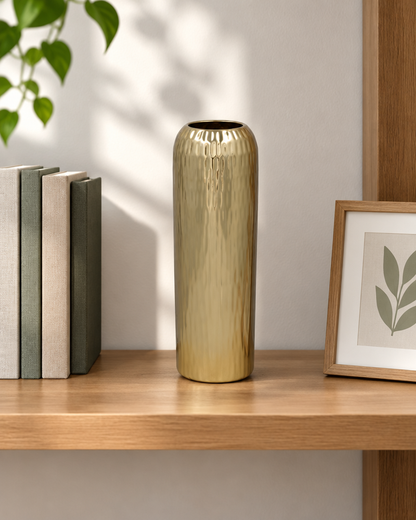 Champagne Gold Textured Cylinder Vase on a wooden shelf