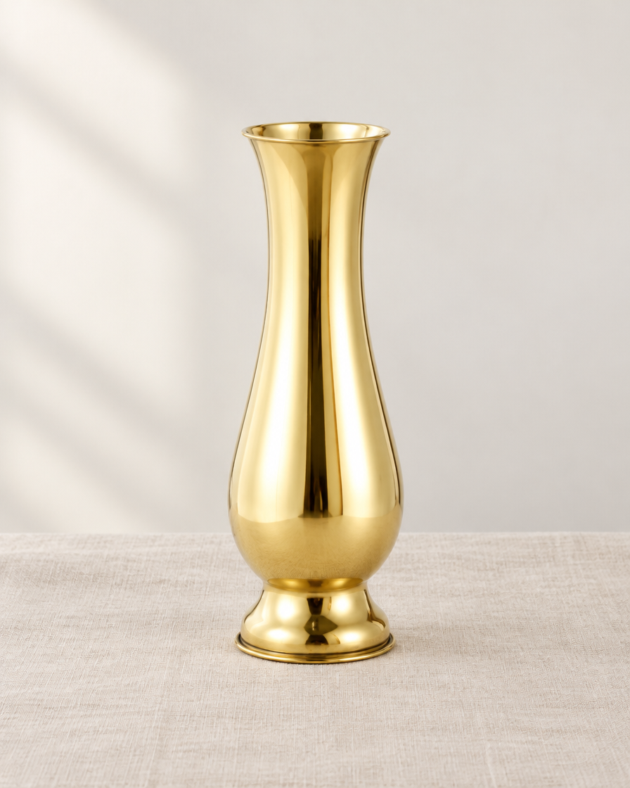 Gold Polished Metal Baluster Vase, shown alone on a linen background
