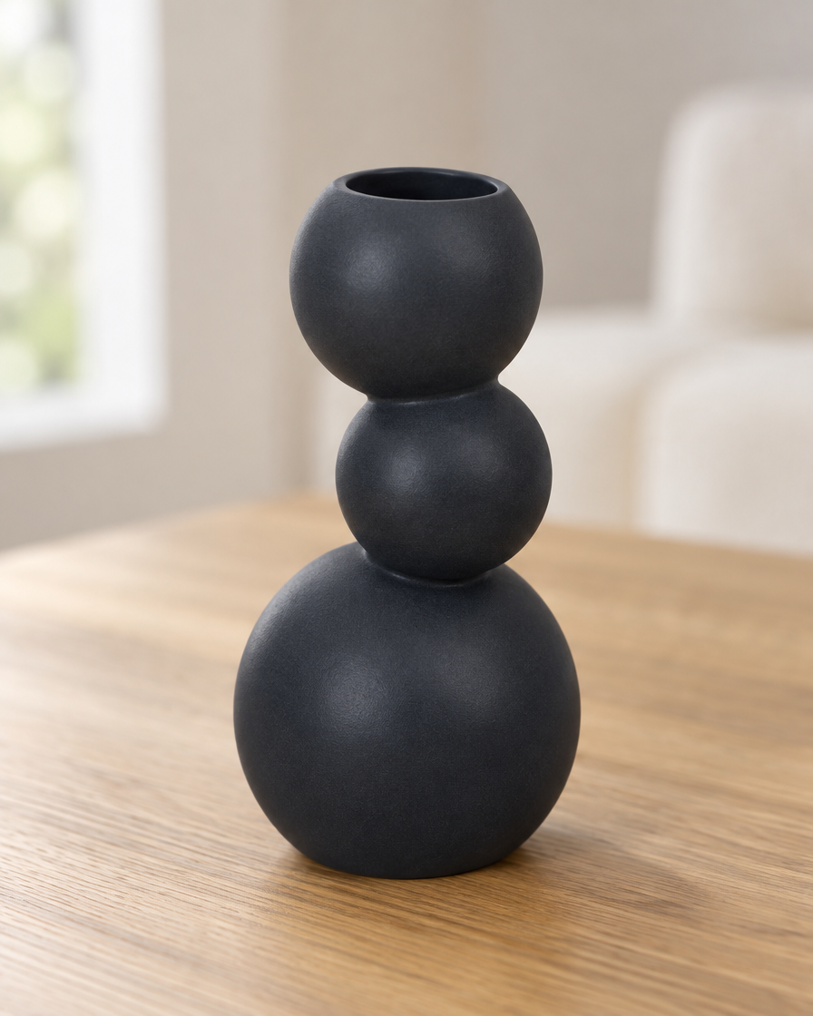 Close-up of the finish of the black stacked ball ceramic vase