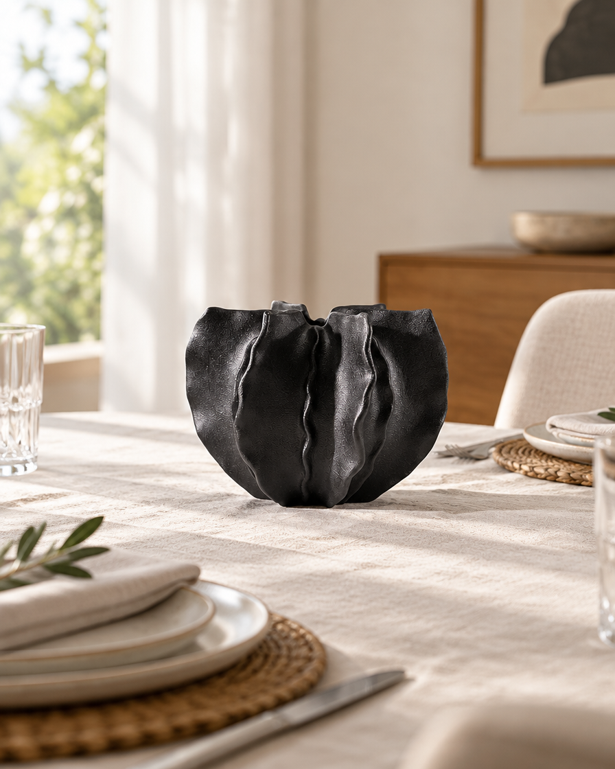 Black Folded Ruffle Ceramic Vase on a dining table