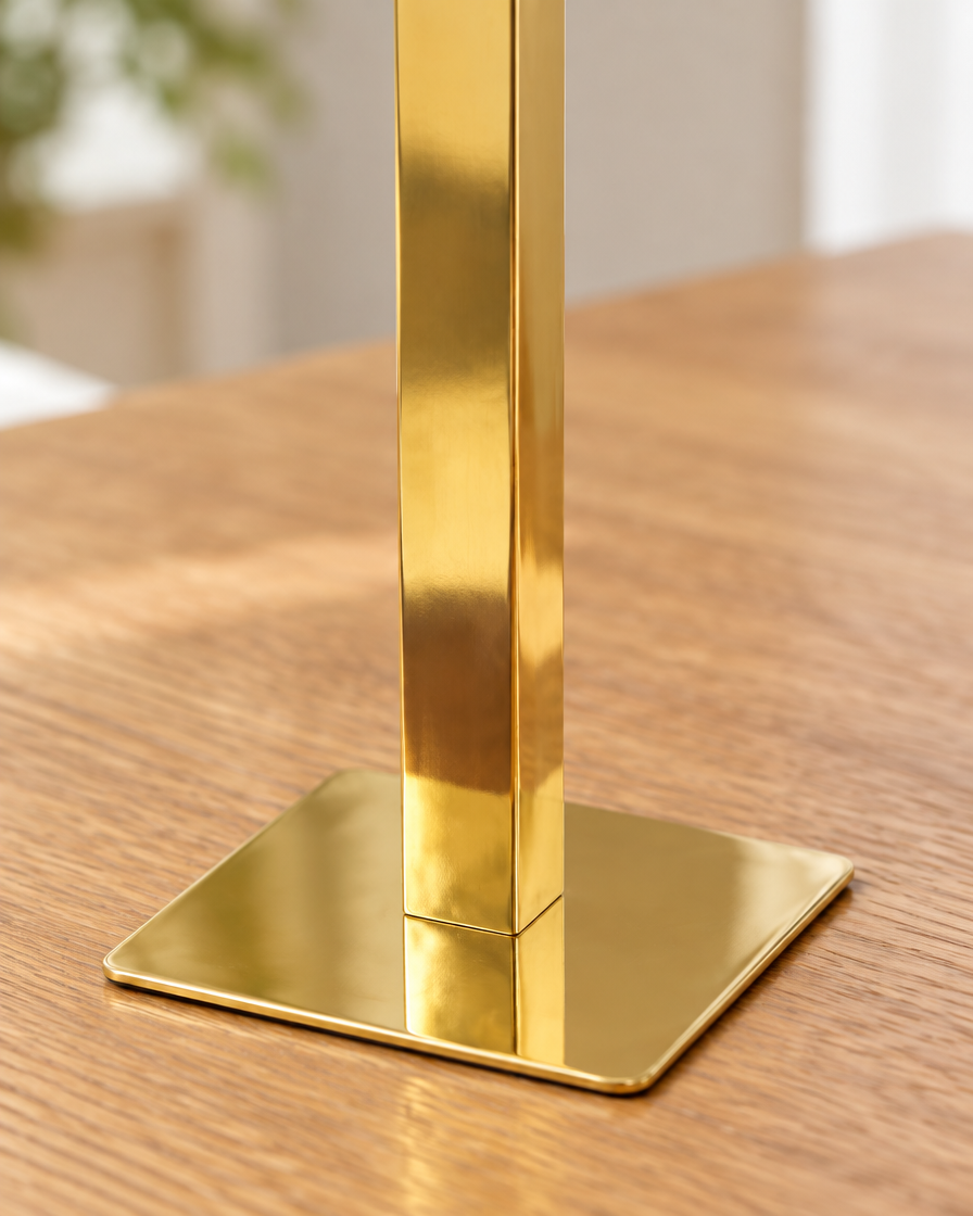 Close-up of the finish of the gold square-tube bud vase