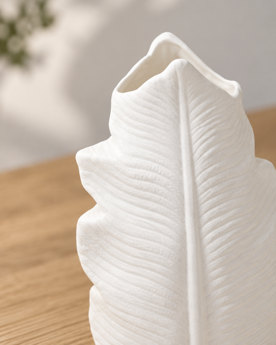 Close-up of the finish of the white matte leaf vase