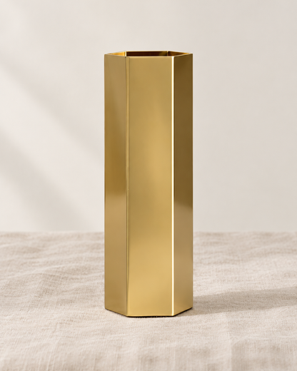 Brass-Tone Hexagonal Metal Vase, shown alone on a linen background